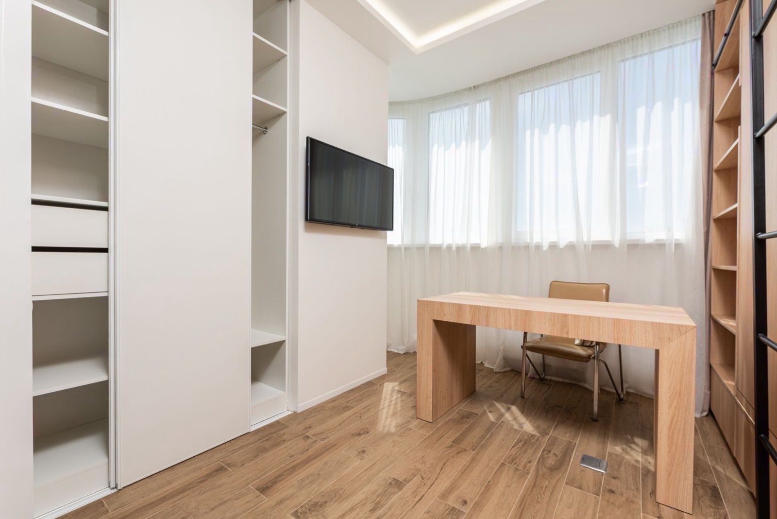 A working office interior in Vienna on a weekday morning.