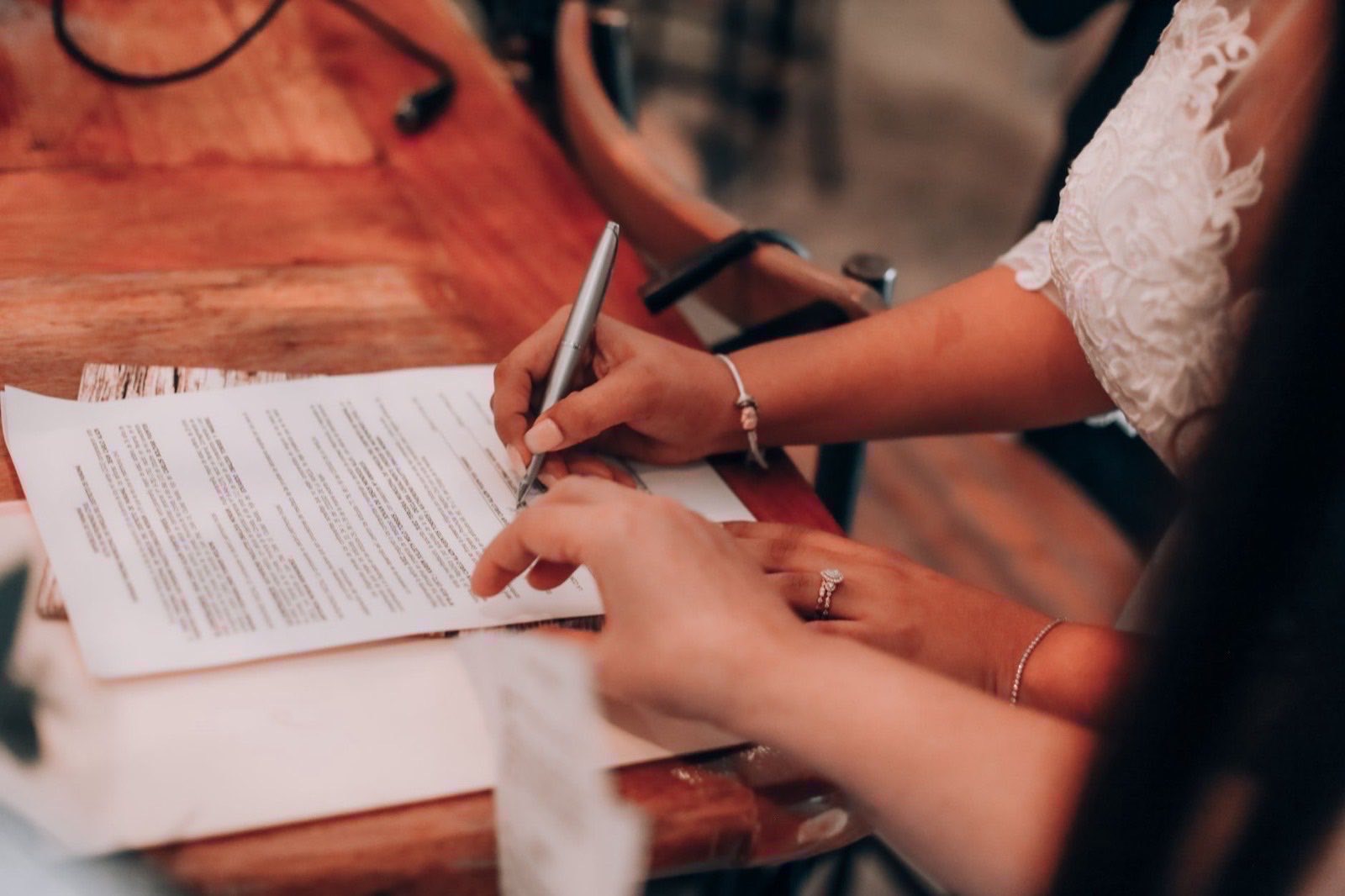 Founder documents and a certified translation set out before a notary appointment.
